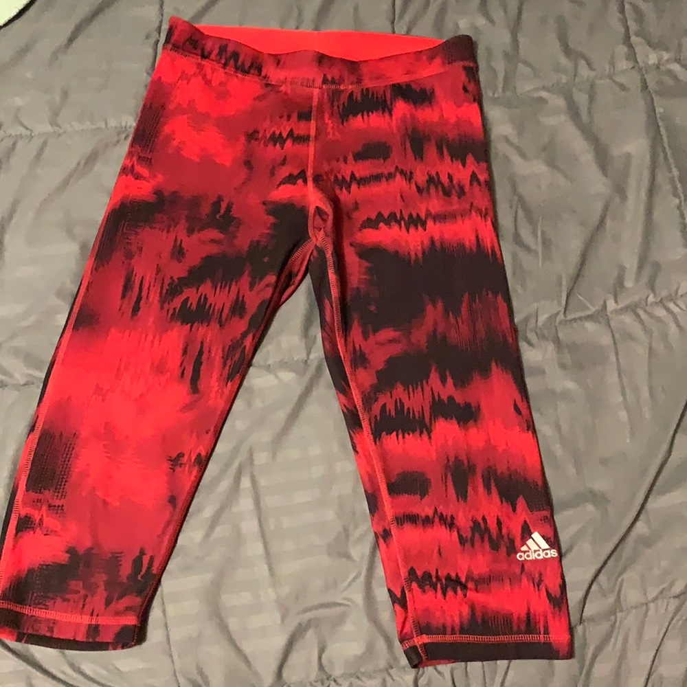 Adidas red and black tech fit workout leggings.